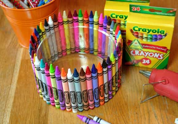 Glue crayons to a glass bowl to hold art supplies (or for a crayon-themed party). 