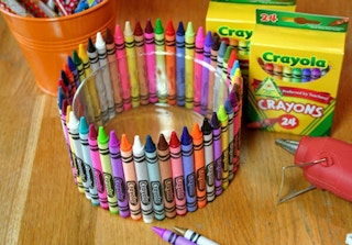 Glue crayons to a glass bowl to hold art supplies (or for a crayon-themed party). 