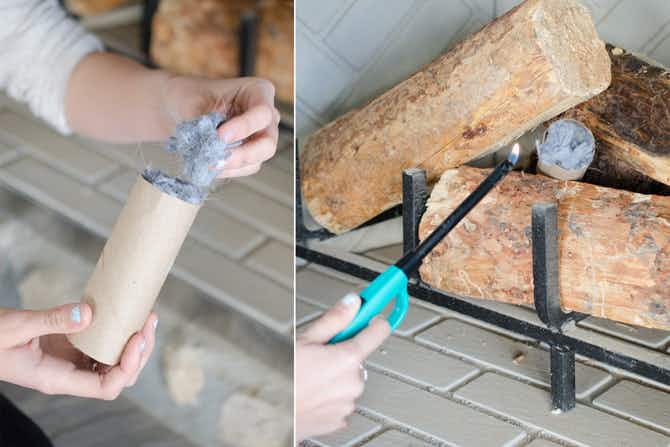 A person starting a fire with dryer lint in a carboard tube.