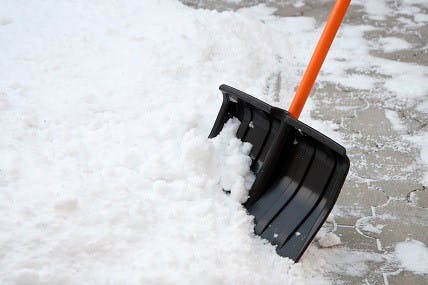 Rub old candle wax over a snow shovel to prevent the snow from sticking.