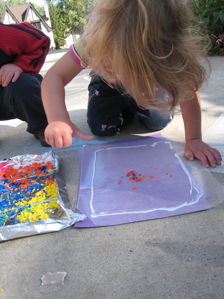 Let your kids create "stained glass" with crayons and wax paper.