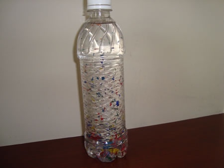 Use shredded crayons to add color to a child's stress bottle.
