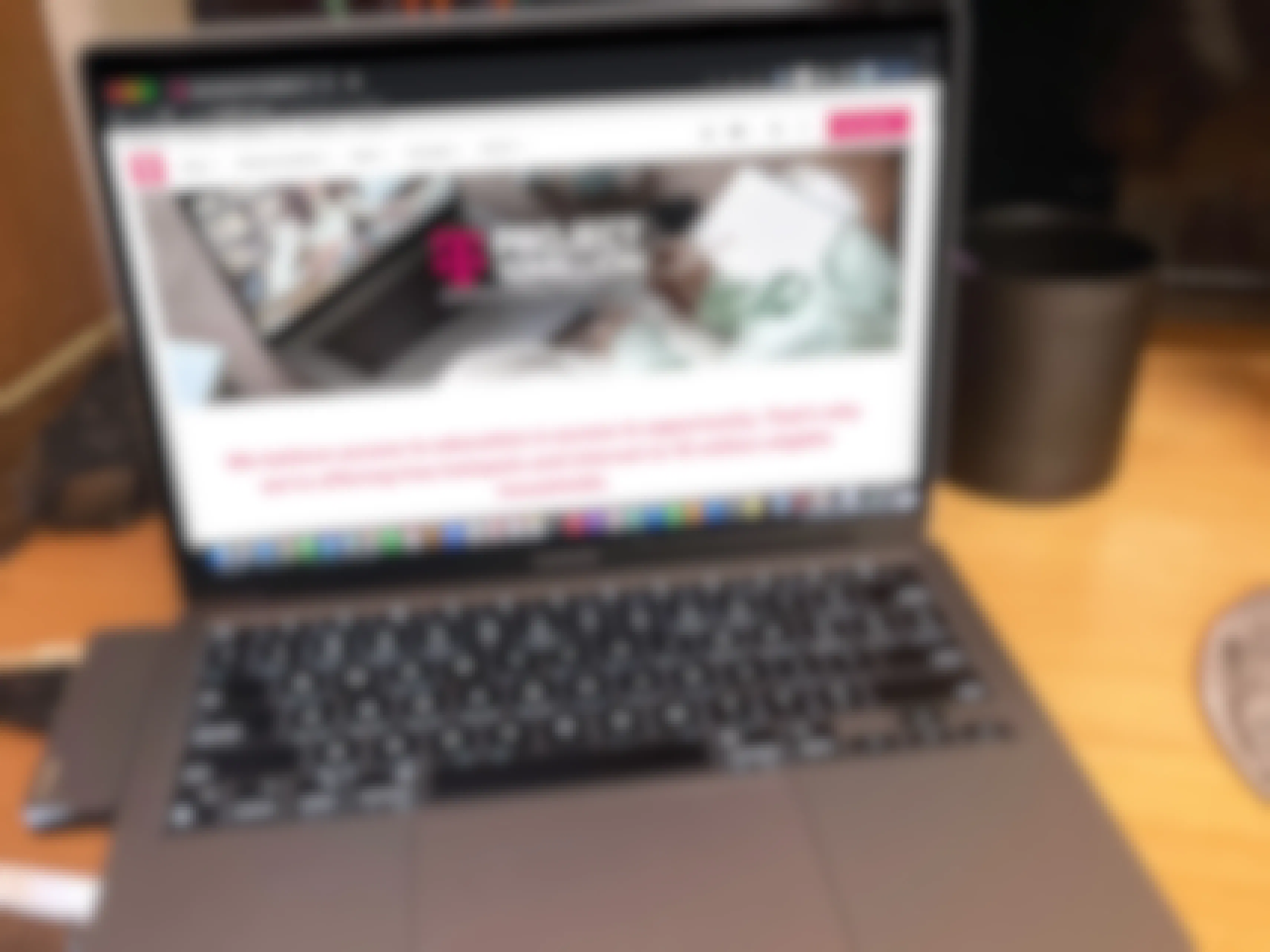 A laptop displaying the T-Mobile Project 10 Million landing page