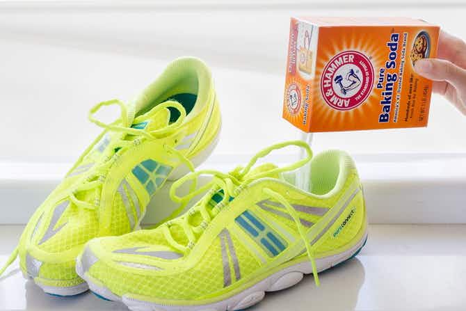 Sprinkle baking soda in shoes to absorb odors.