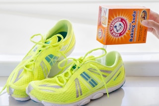 Sprinkle baking soda in shoes to absorb odors.