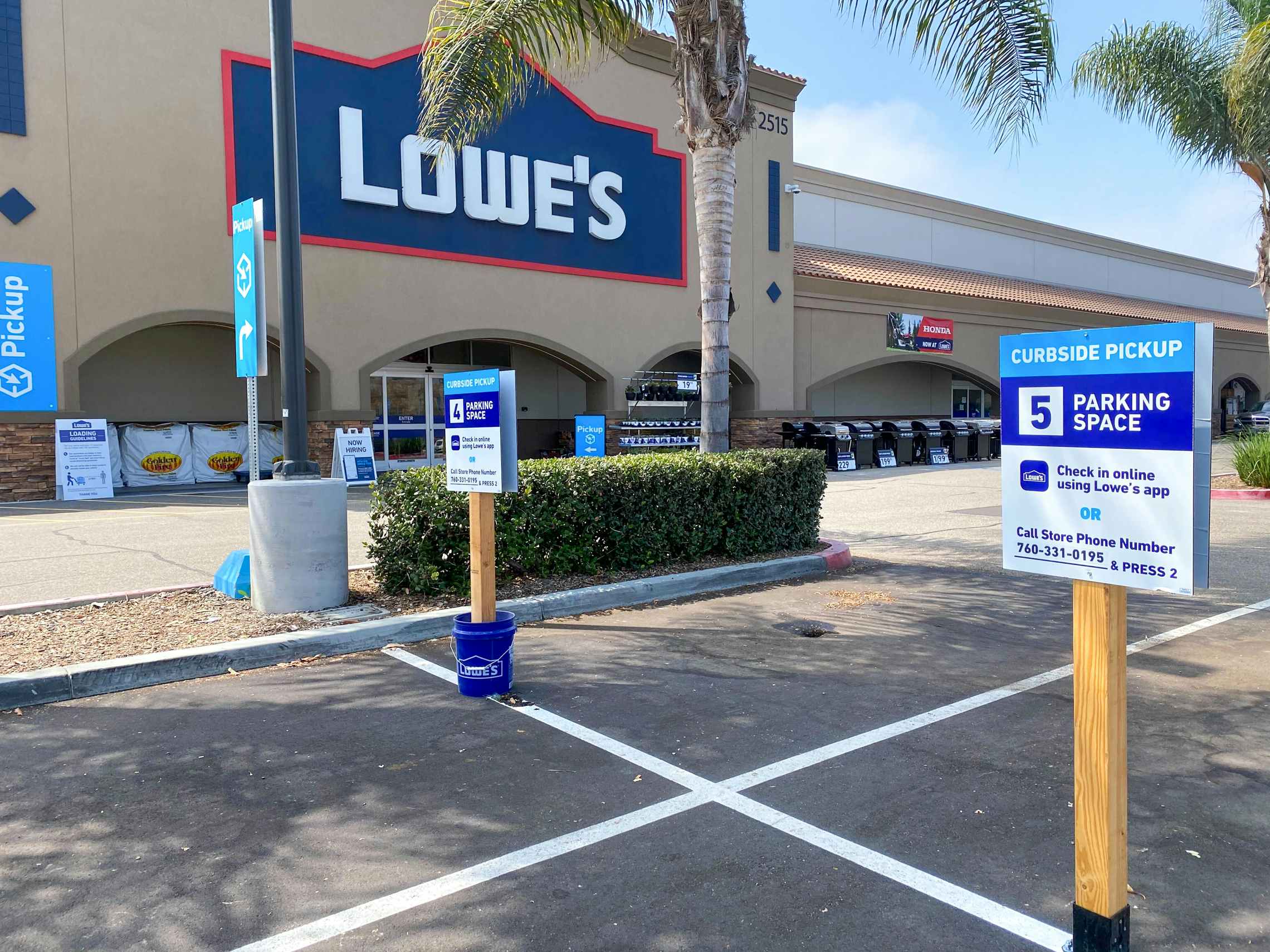 Lowe's curbside pickup parking spots in front of the Lowe's store.