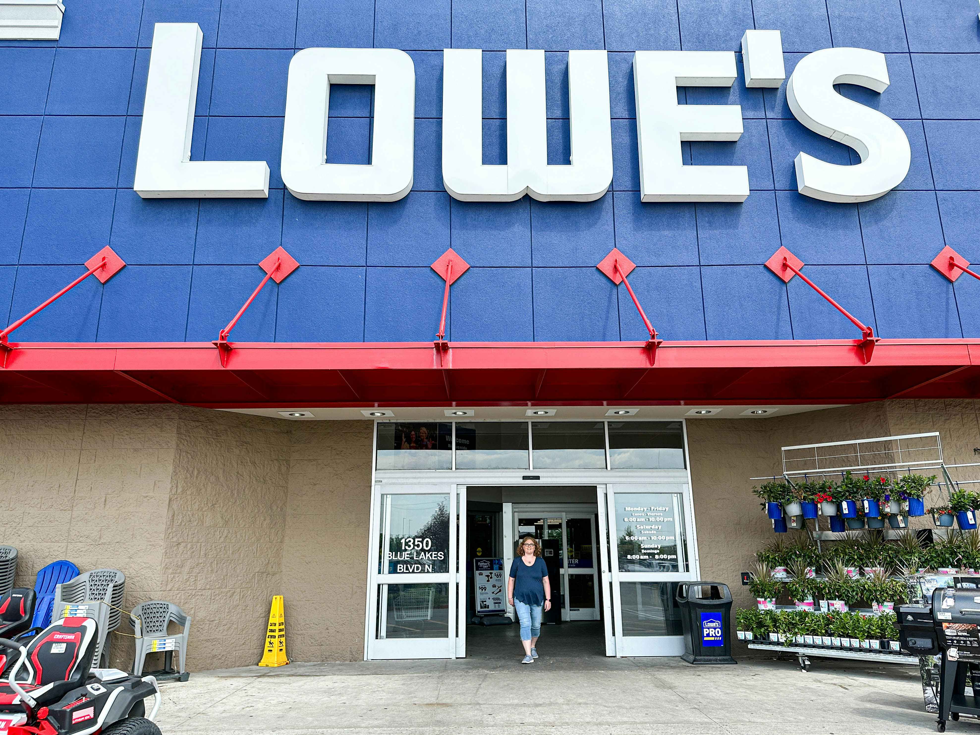 a person exiting a lowes store