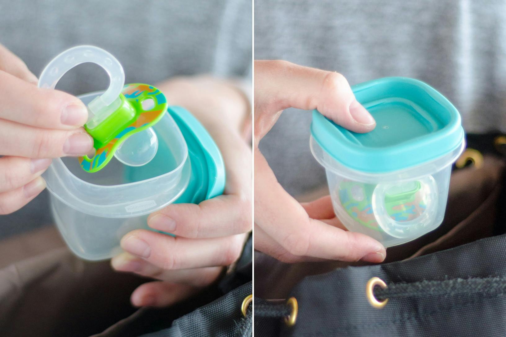 someone putting a pacifier in a tupperware
