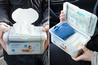 person holding repurposed baby wipes container