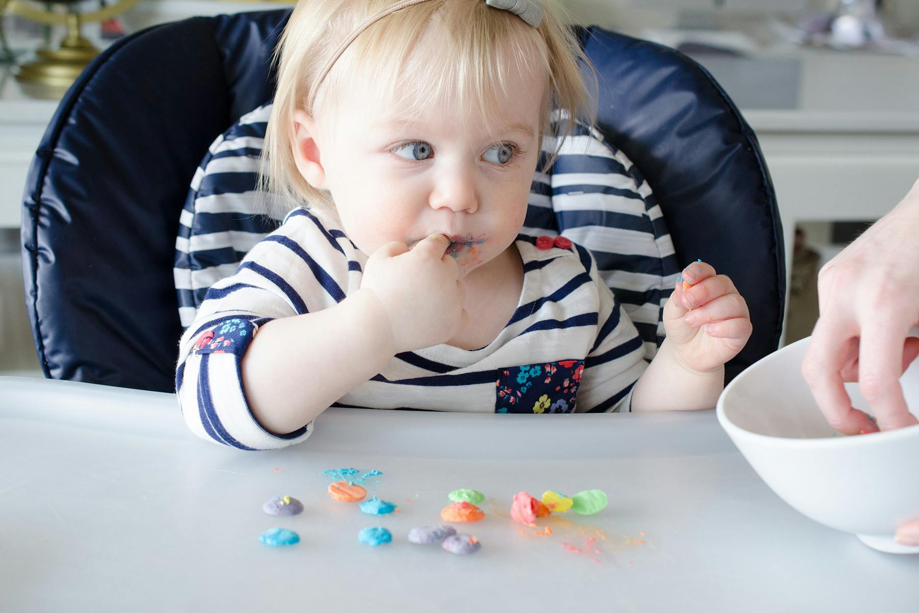 kid eating frozen yogurt dots