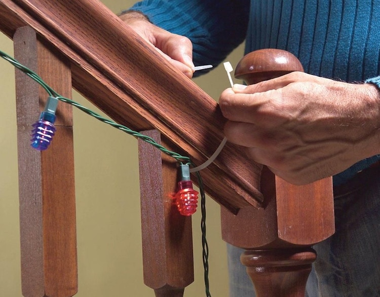 Hang holiday decor with zip ties for easy removal.