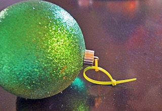 Hang ornaments with zip ties.