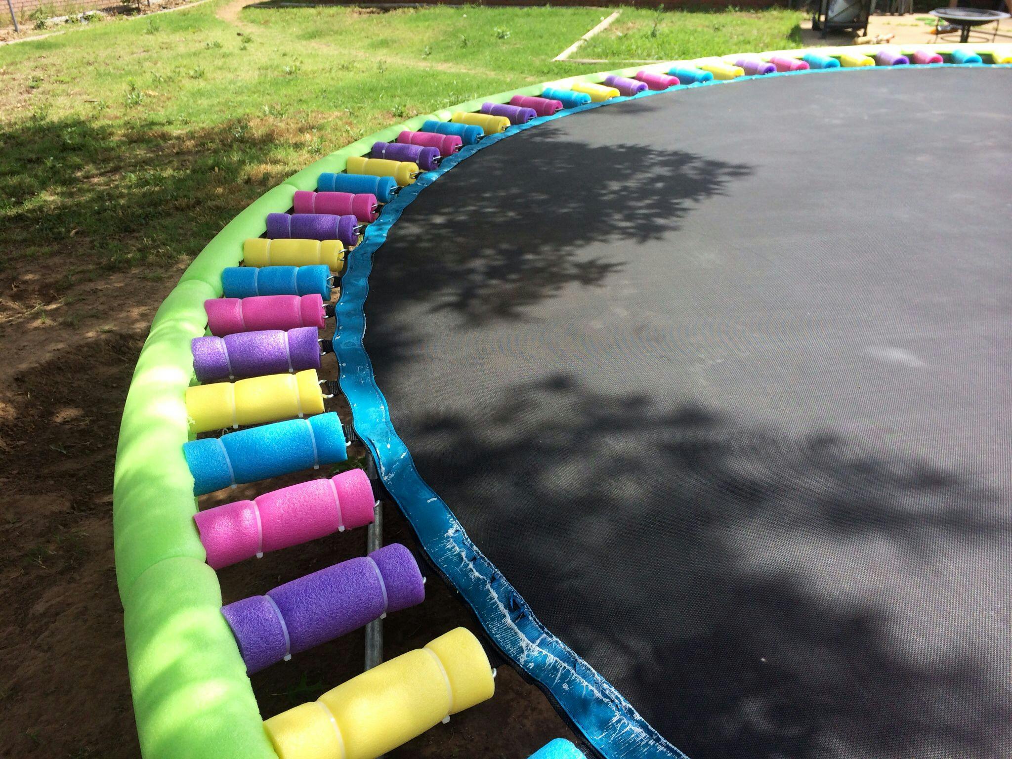 Attach pool noodles to a trampoline for safety.