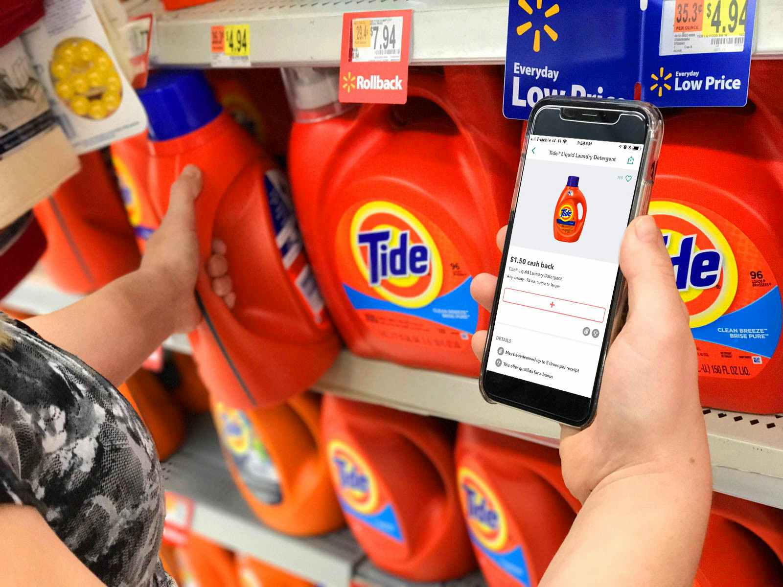person grabbing tide detergent and looking at product in walmart app on phone
