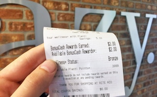 hand holding a Rite Aid receipt showing this person's BonusCash balance.
