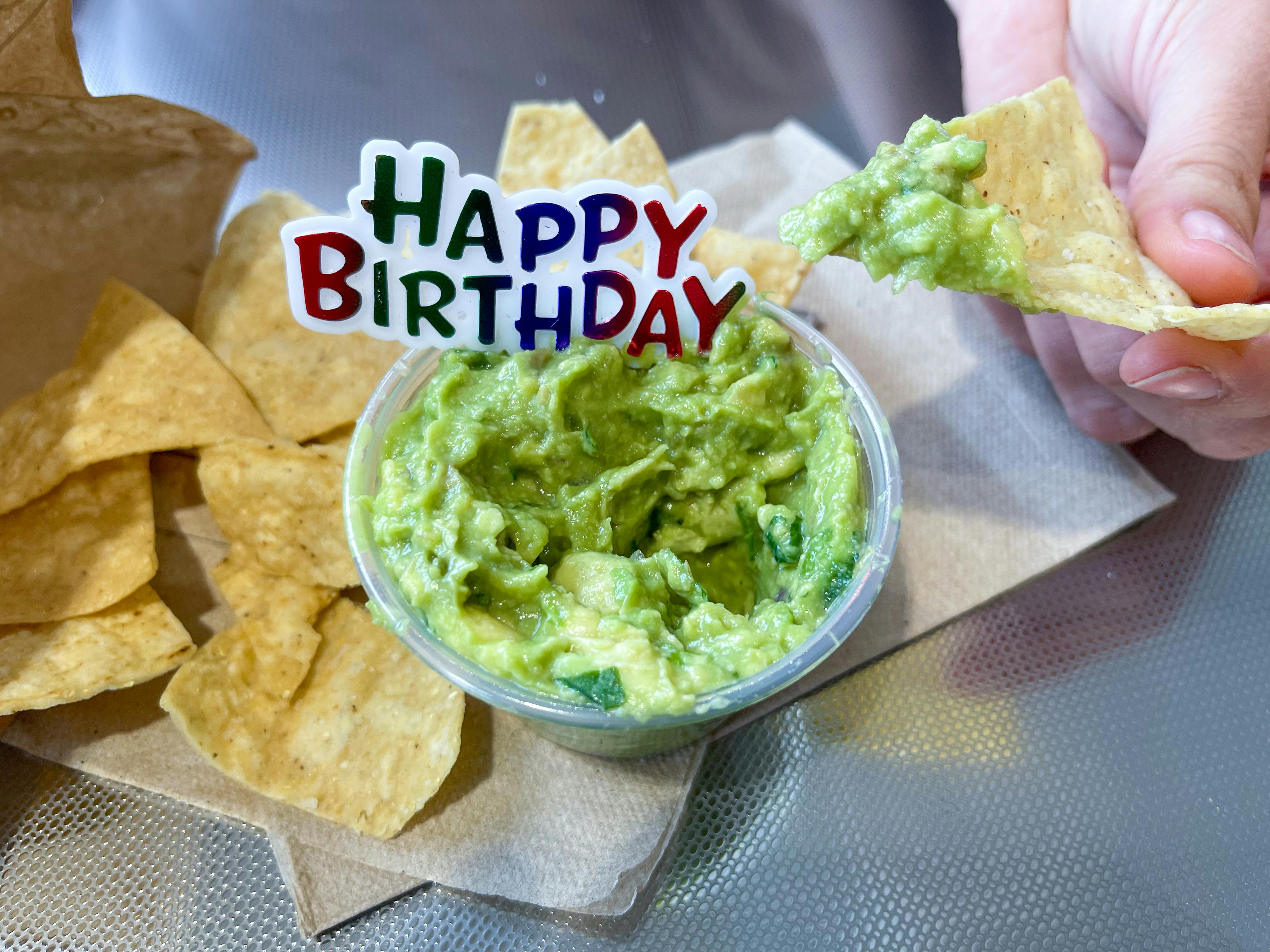 guacamole with happy birthday sign