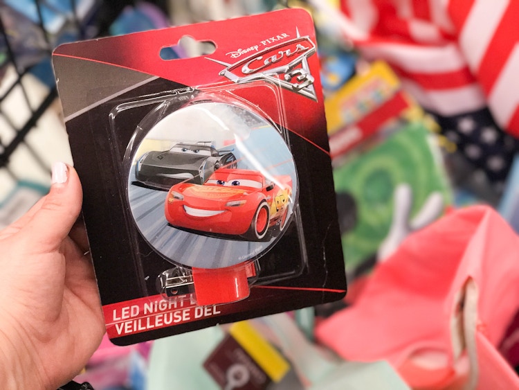 someone holding disney cars nightlight