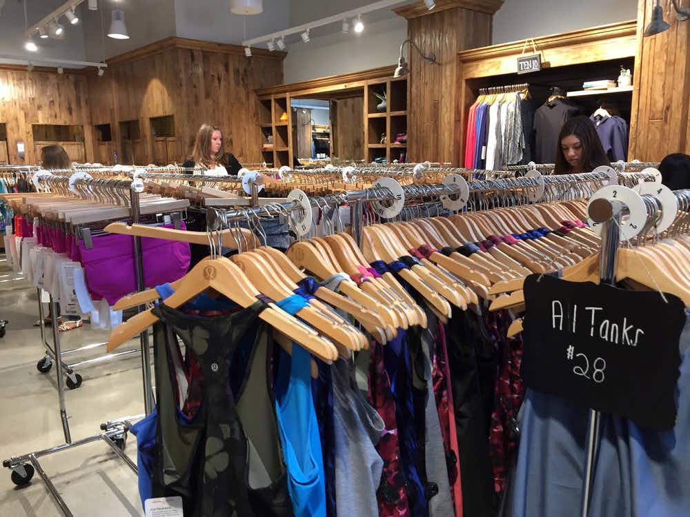 interior of a lululemon outlet store with clothes displays
