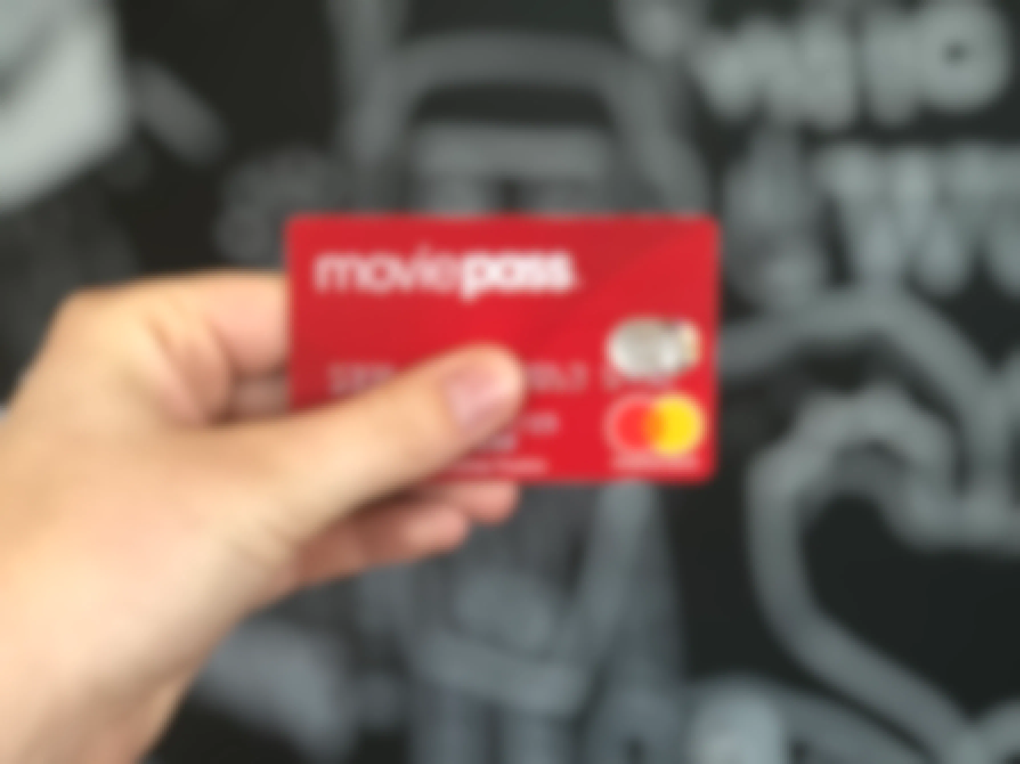 A hand holding a MoviePass debit card, a payment option that will be part of the MoviePass 2.0 program.