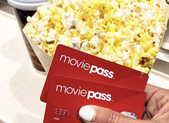 MoviePass 2.0 cards with popcorn in the background. 
