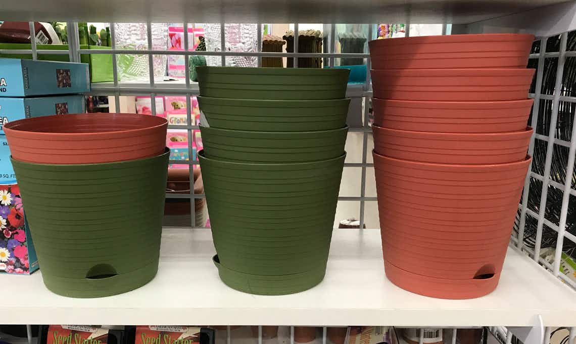 Plant pots stacked up on a shelf