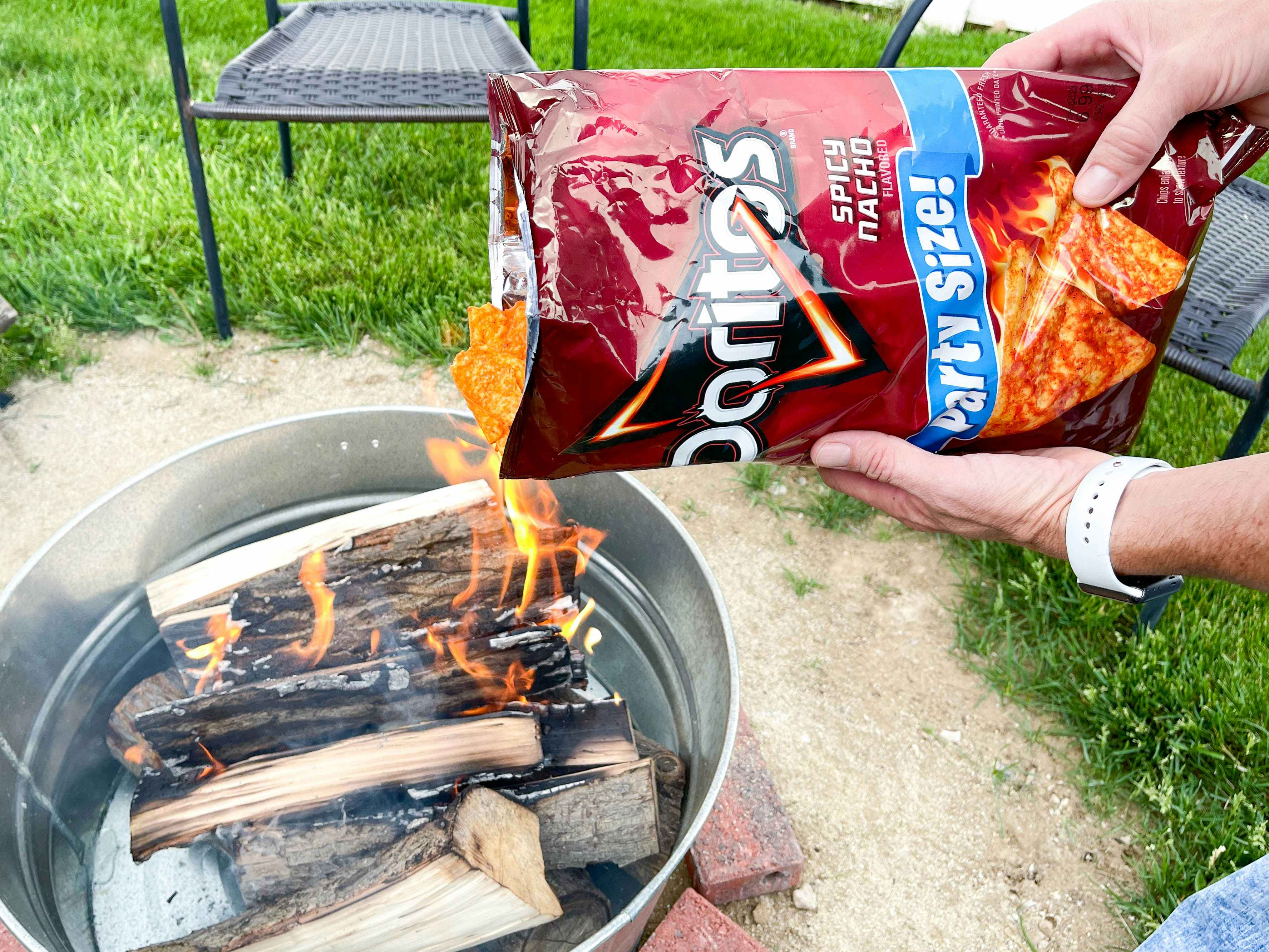doritos being poured on a fire 