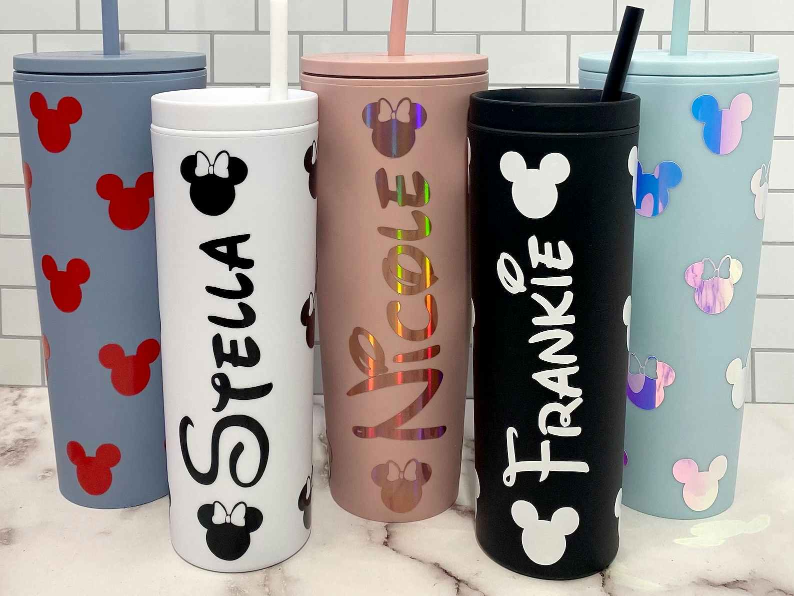 personalized disney-themed water bottles and tumblers from etsy