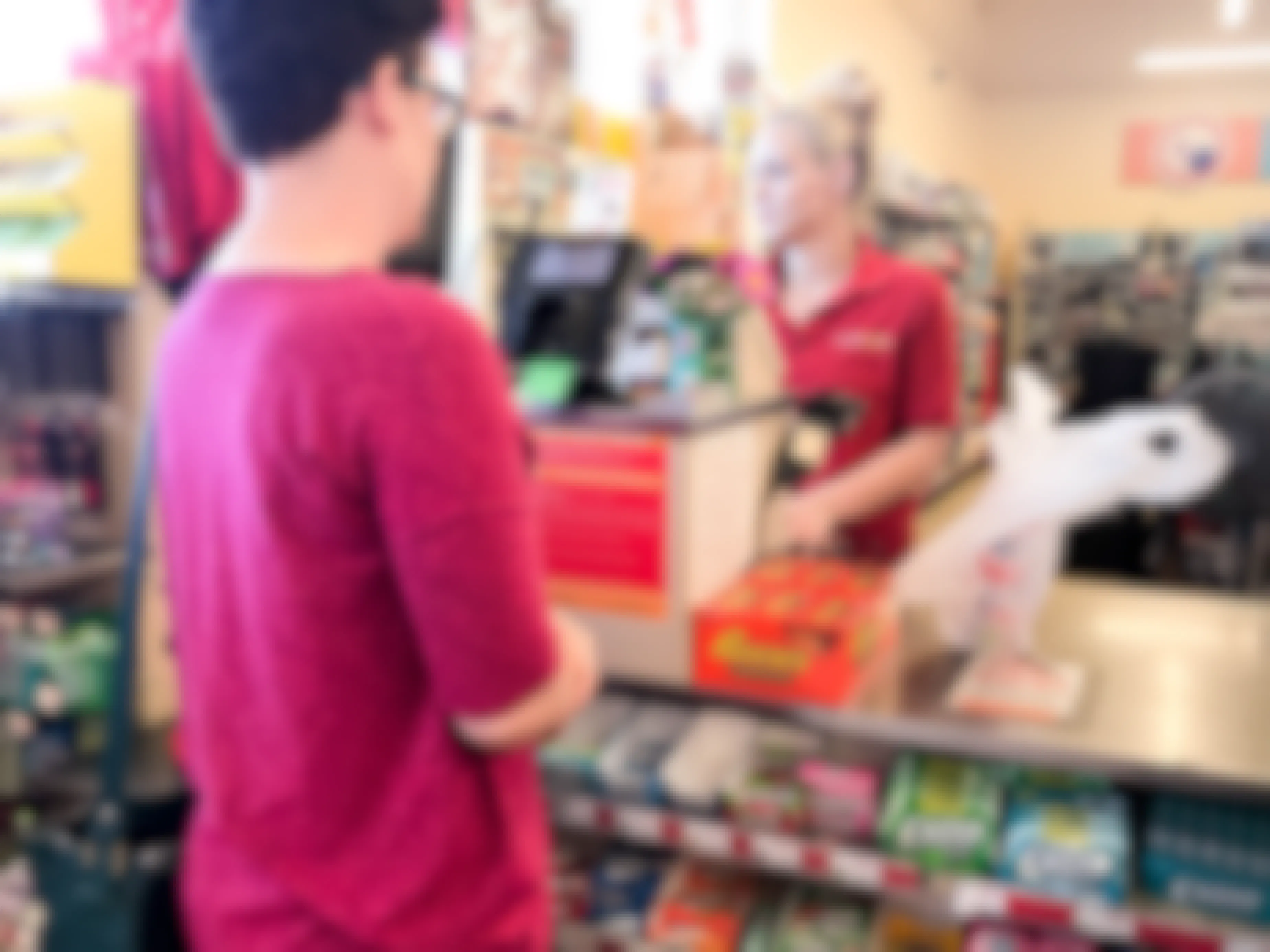 Woman standing out a Family Dollar store checkout