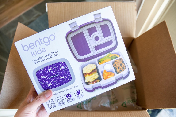 Bentgo kids lunch box being pulled from an amazon box