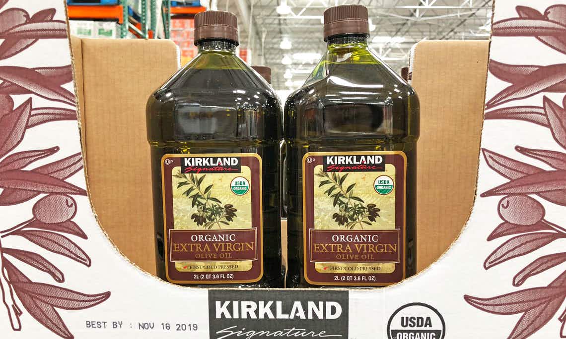 kirkland brand olive oil in box on shelf in store 