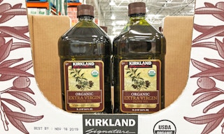 kirkland brand olive oil in box on shelf in store
