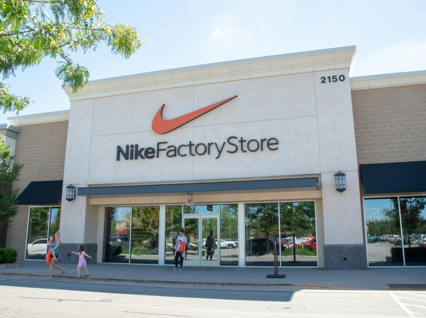 A Nike Factory Store building storefront.