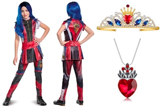 A young girl wearing a Princess Evie costume with a tiara and necklace on a white background.