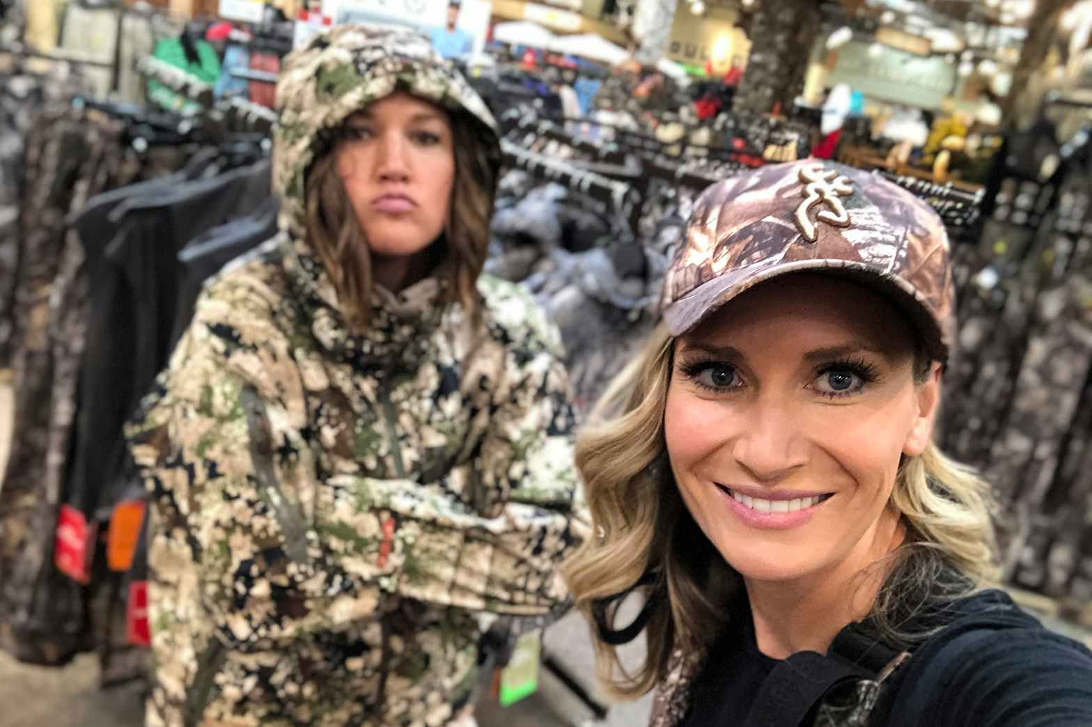 two people shopping at cabela's