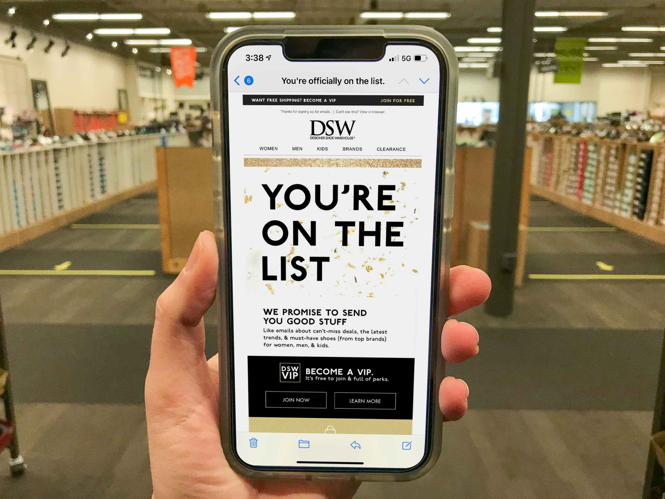A sign up email on a cell phone that says "DSW. You're On the List".