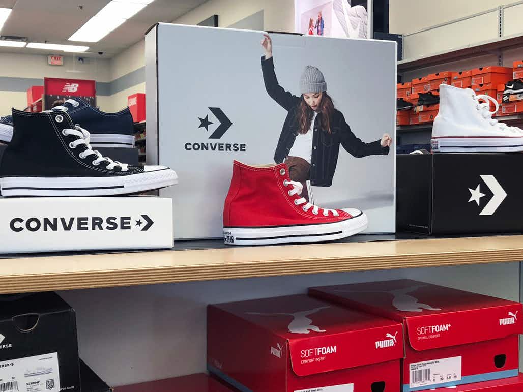 converse high-top chuck taylors on display in rack room shoes store
