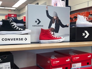 converse high-top chuck taylors on display in rack room shoes store