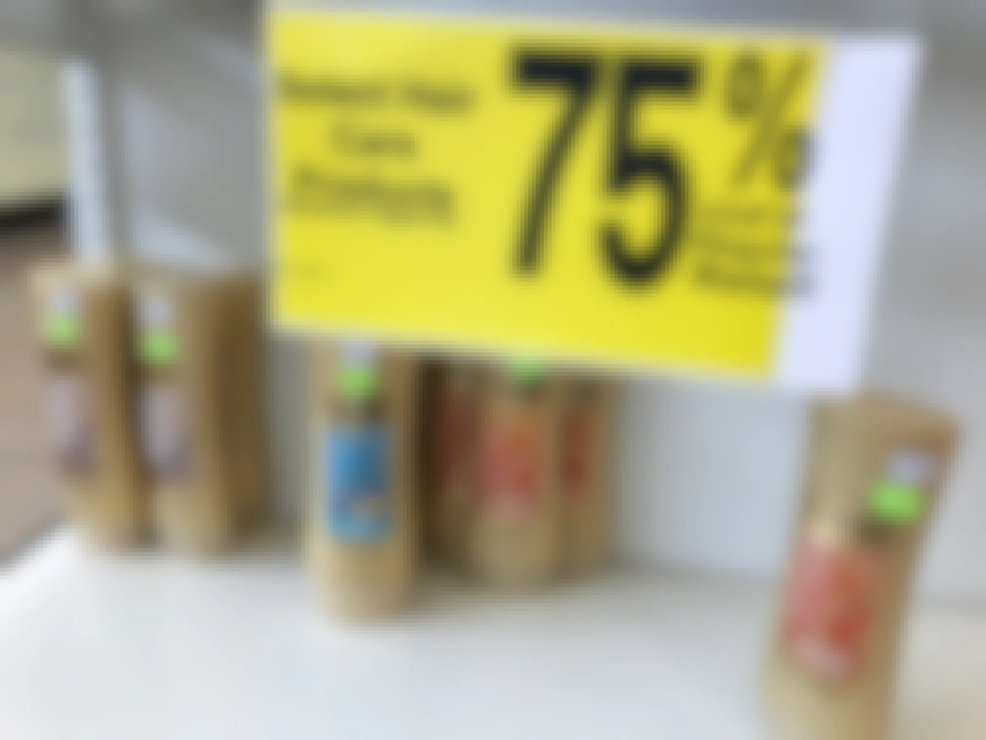 Clearance shelf with hair care and a sign that says, "select hair care products 75% off.