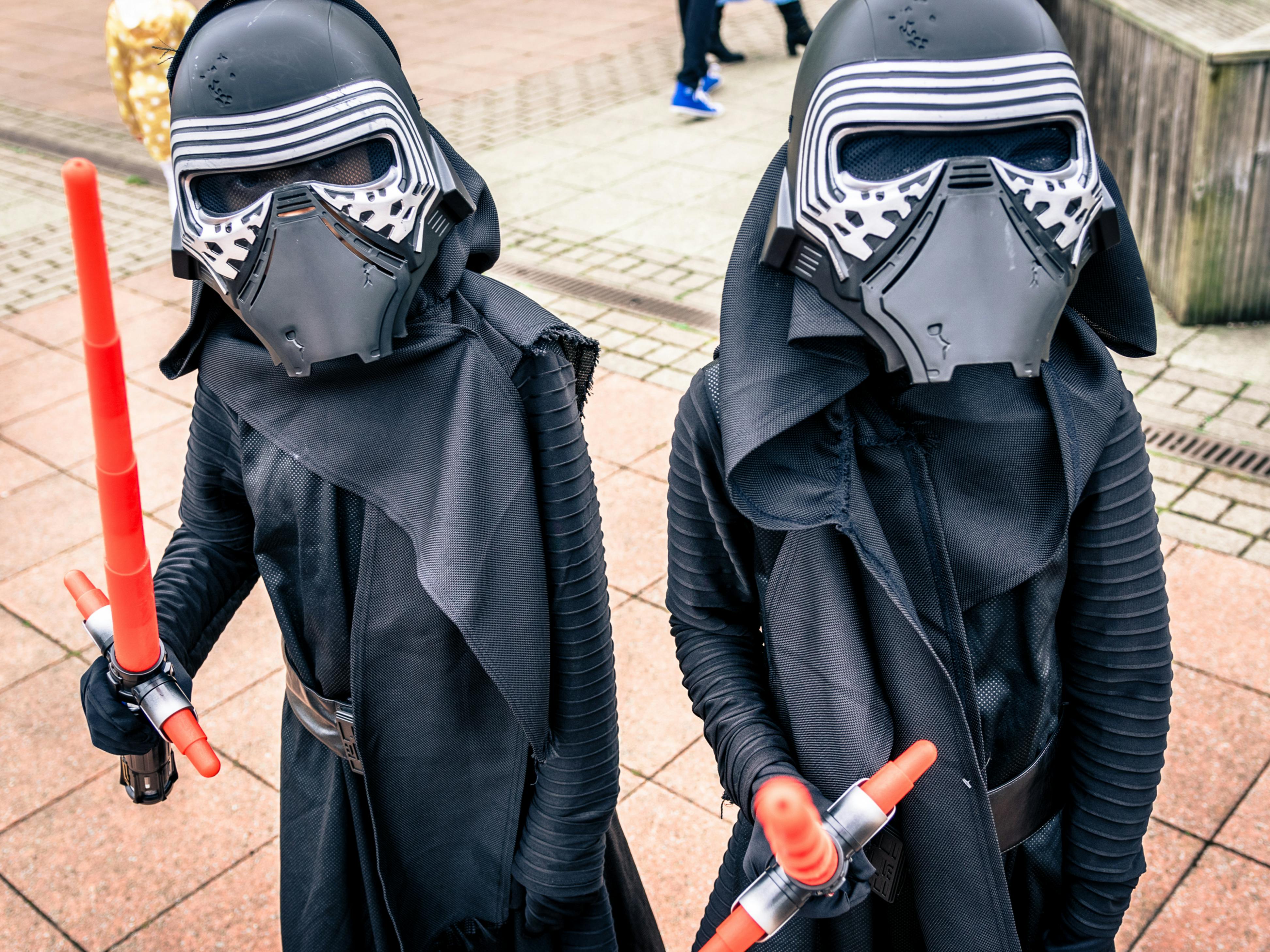 Two kids dressed up as Kylo Ren for Halloween