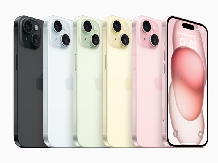 multiple apple iphone 15s lined up