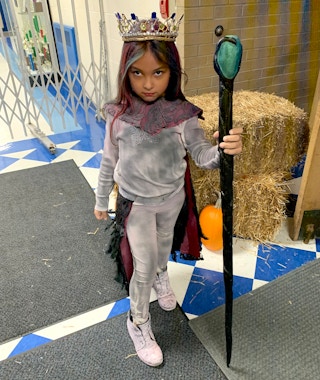 A girl in a DIY Audrey from Descendants Halloween costume