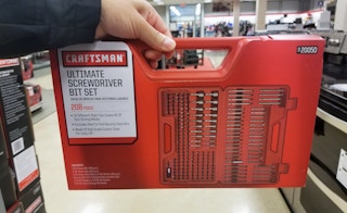 someone holding up a craftsman ultimate screwdriver bit set