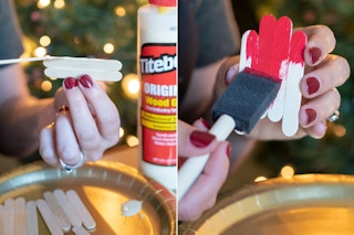 someone gluing popsicle sticks together and painting it red