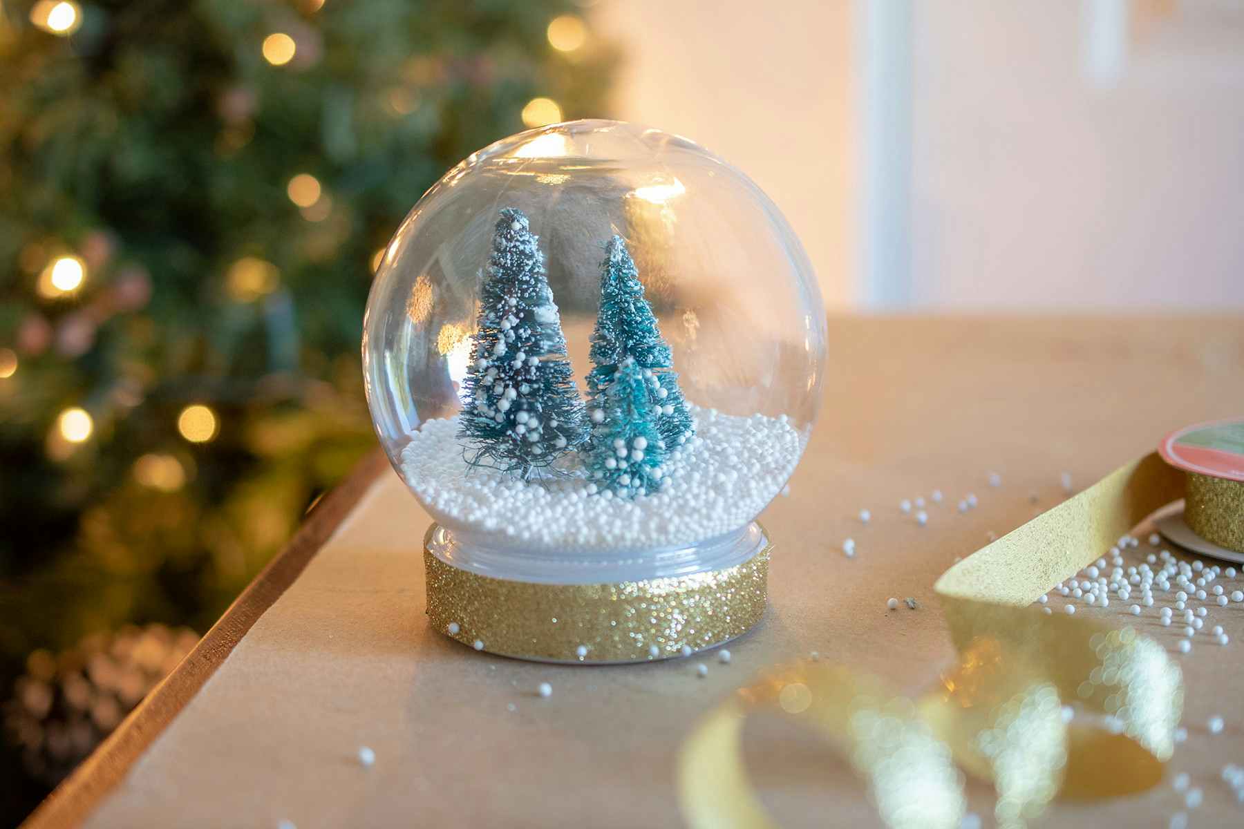 a snowglobe with trees in it
