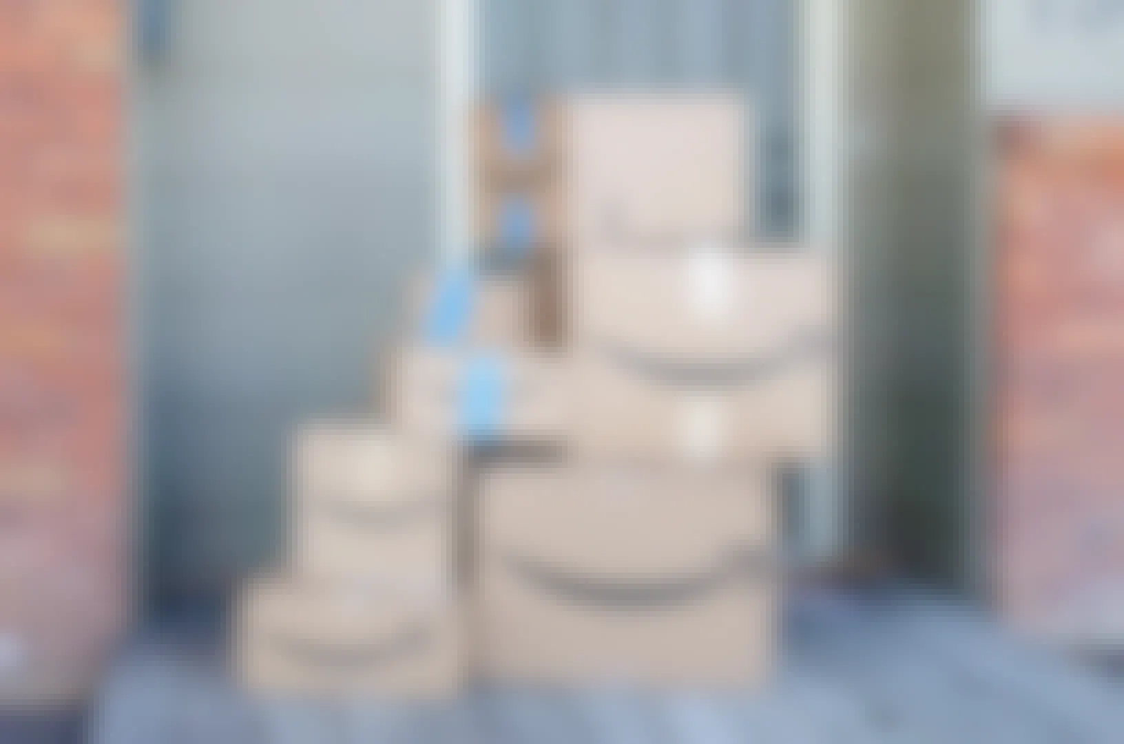 amazon boxes stacked on porch