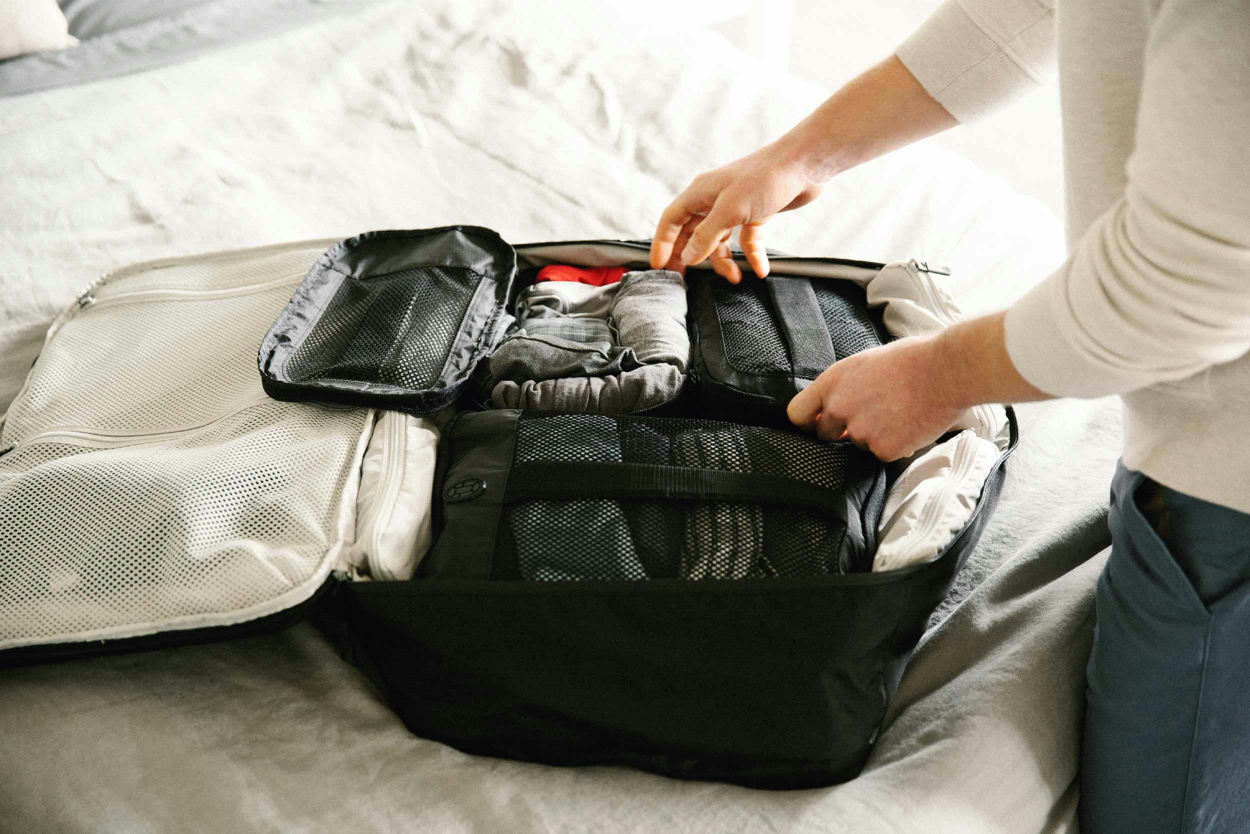 20 Sanity-Saving Packing Hacks for Traveling with Kids