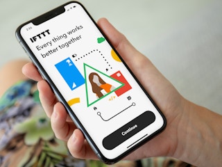 Someone looking at the IFTTT app on their phone