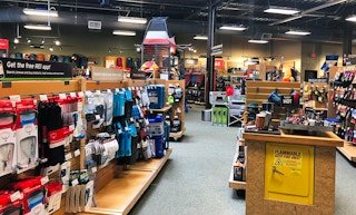 The camping gear section inside of REI.