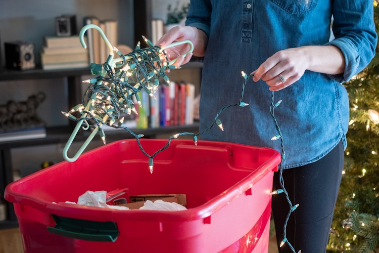 Christmas lights wrapped around a clothes hanger.