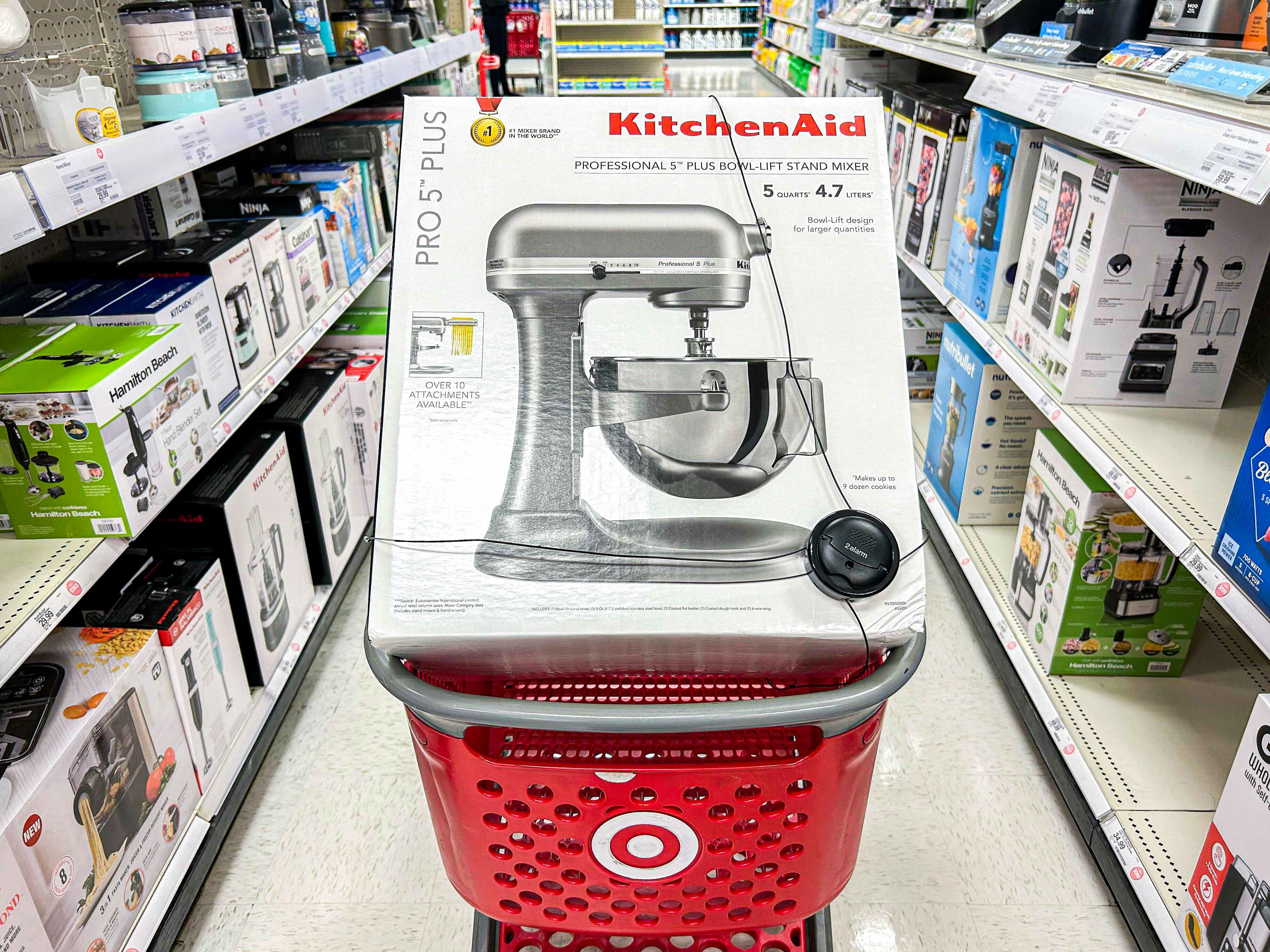 box of KitchenAid mixer in a shopping cart at Target